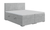 Stilvolles graues Boxspringbett mit Stauraum und weißer Matratze.
