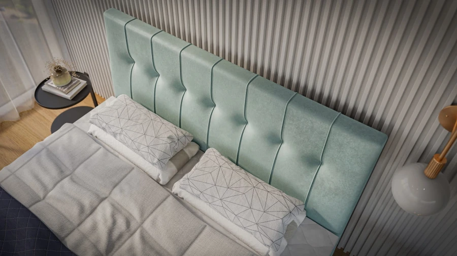 Detailansicht Kopfteil mintgrünes Samtbett in einem hellen Schlafzimmer.