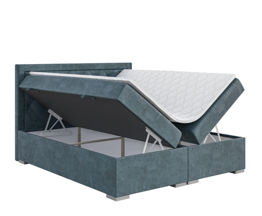 Modernes blaues Polsterbett mit praktischem Bettkasten und hochgeklappter Matratze für Stauraum.