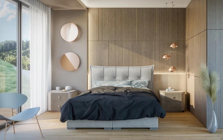 Modern eingerichtetes Schlafzimmer mit grauem Boxspringbett, dunkler Decke und stilvoller Holzoptik-Wand.