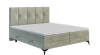 Salbeigrünes Boxspringbett mit gestepptem Kopfteil und schwarzen Füßen.