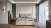Elegantes beiges Polsterbett im modern gestalteten Schlafzimmer mit grauer Bettwäsche und Parkett.