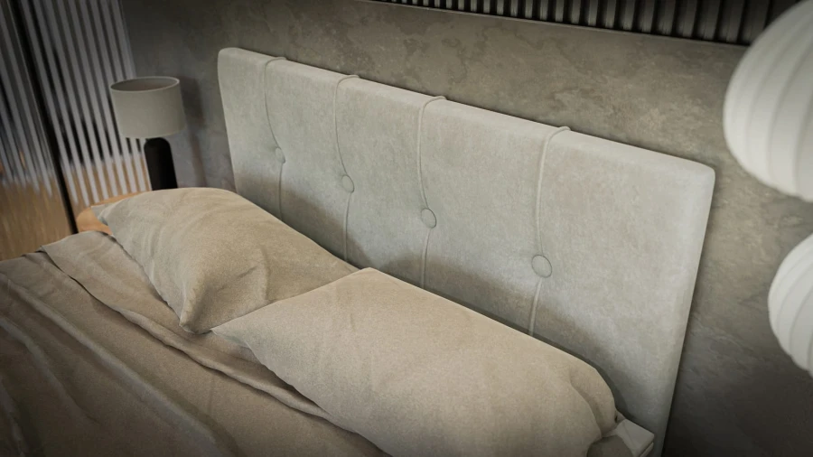 Detailansicht des gepolsterten Kopfteils eines Boxspringbetts mit eleganter Knopfsteppung.