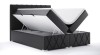 Schwarzes Boxspringbett mit offenem Bettkasten für Stauraum und dekorativer Rautensteppung.