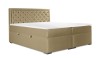 Elegantes Boxspringbett in Beige mit gestepptem Kopfteil auf weißem Hintergrund.