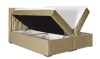 Beiges Boxspringbett mit zwei aufgeklappten Bettkästen für zusätzlichen Stauraum.
