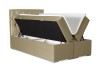 Beige gepolstertes Boxspringbett mit praktischem Bettkasten und Stauraum.