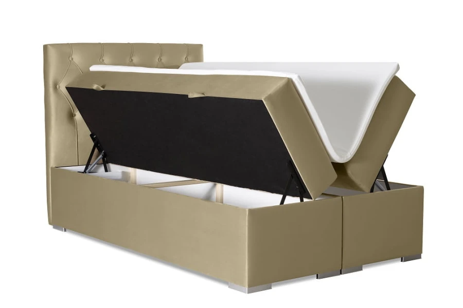 Beige gepolstertes Boxspringbett mit praktischem Bettkasten und Stauraum.