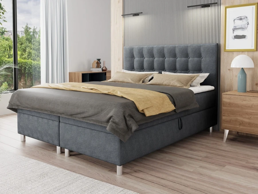 Dunkelgraues Boxspringbett mit Steppung in modernem Zimmer