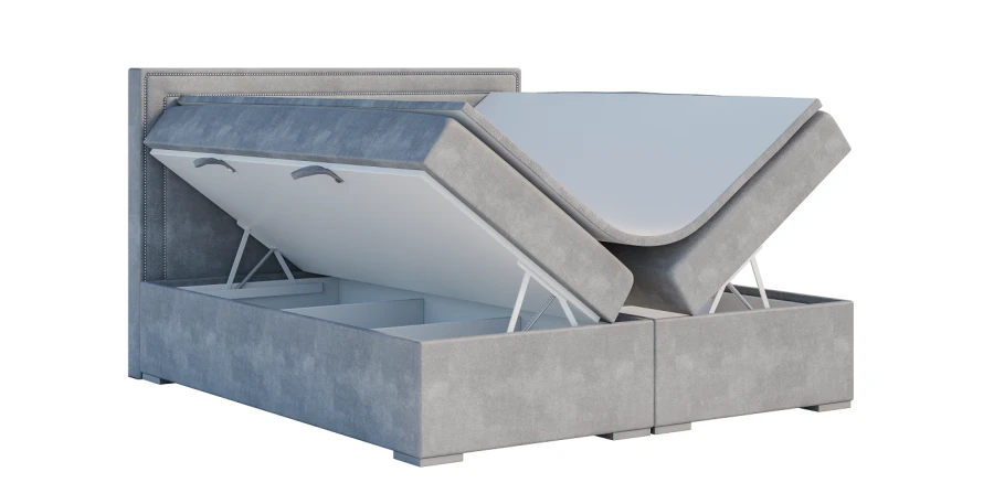 Graues Boxspringbett mit zwei aufgeklappten Bettkästen für großzügigen Stauraum unter der Matratze.