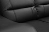 Gepolsterte Segmente der Rückenlehne eines schwarzen Sofas mit präziser Steppung.