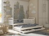 Weißes Ausziehbett für zwei Kinder mit Bettkasten und Stadt-Motiv.