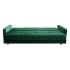 Samt-Schlafsofa in Grün, komplett ausgeklappt als bequeme Liegefläche für Gäste.