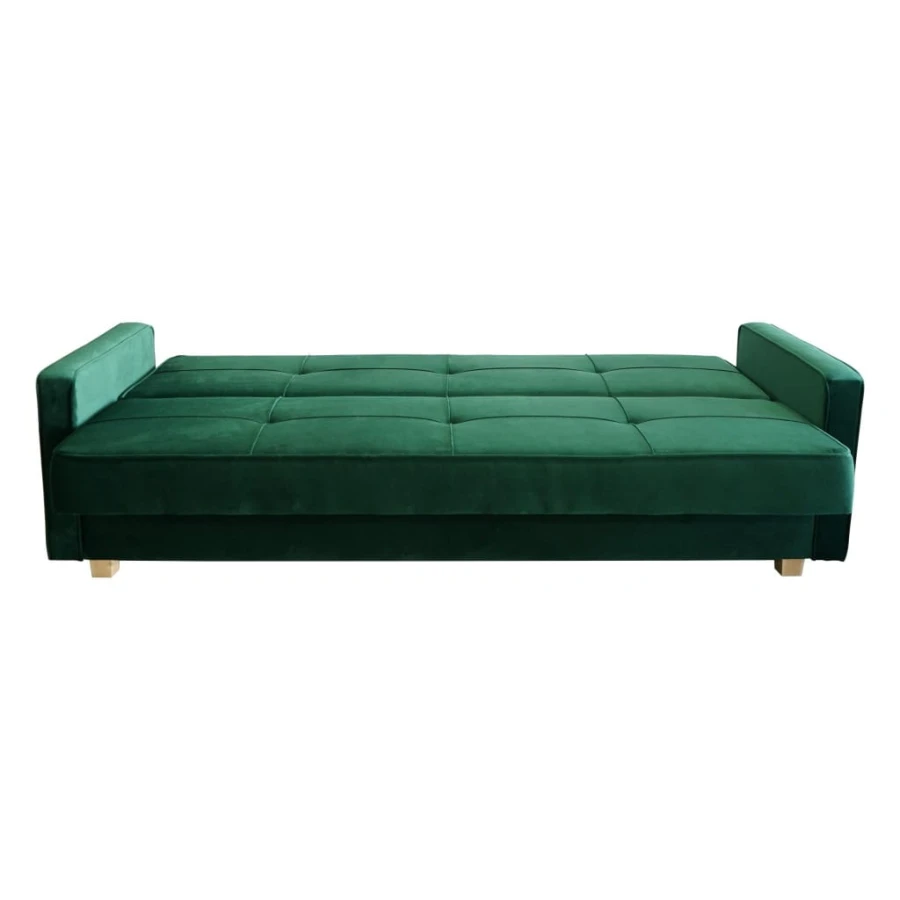 Samt-Schlafsofa in Grün, komplett ausgeklappt als bequeme Liegefläche für Gäste.