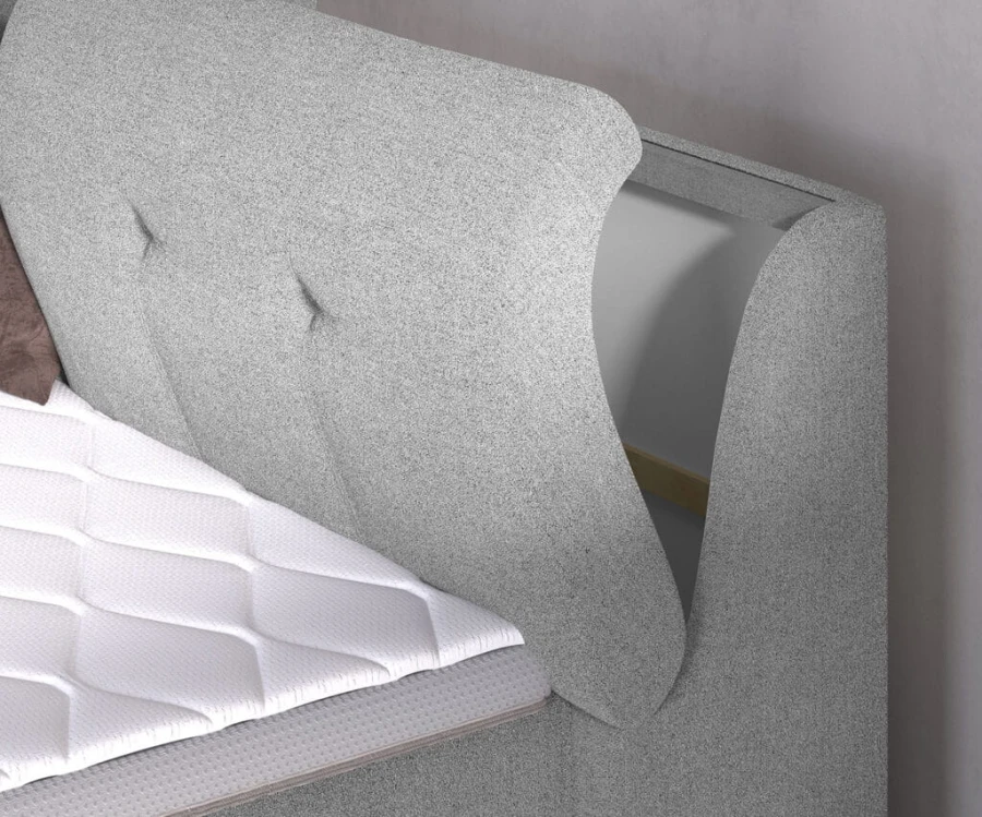 Praktisches Staufach im Kopfteil des Boxspringbettes zur diskreten Aufbewahrung.