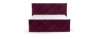 Weinrotes Boxspringbett mit samtigem Bezug und geometrischer Steppung vor weißem Hintergrund.