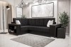 Dunkelgraues Ecksofa mit schwarzem Korpus und praktischem Regal im Wohnzimmer.