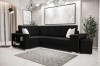Schwarzes Ecksofa im minimalistischen Wohnzimmer mit Regal-Seitenteil.