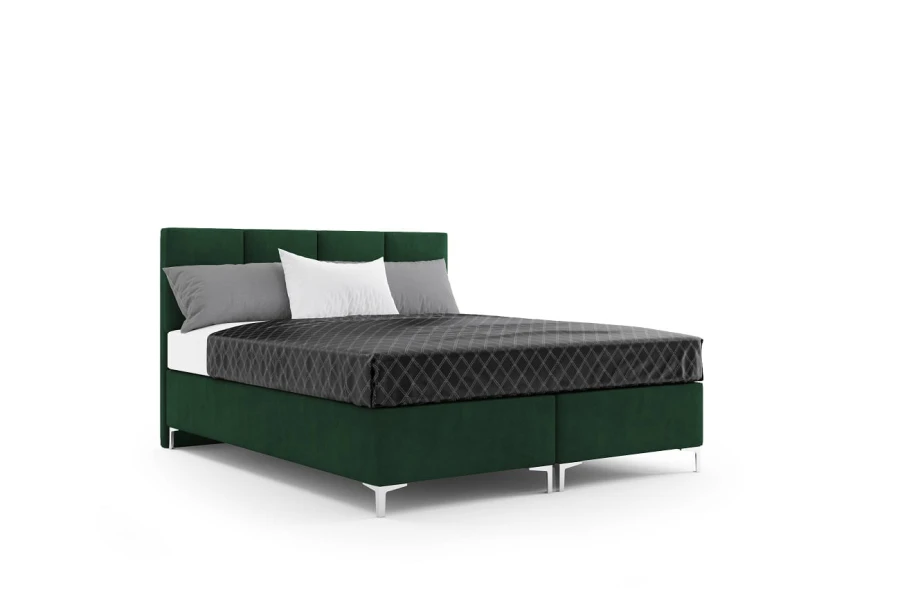 Modernes Boxspringbett in Dunkelgrün mit gepolstertem Kopfteil und eleganten Metallfüßen.