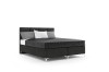 Schwarzes Boxspringbett mit silbernen Füßen und grauer Bettwäsche auf weißem Hintergrund.