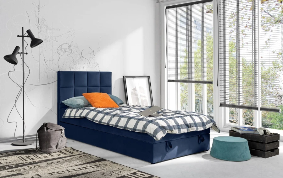Dunkelblaues Polsterbett 90x200 mit Samt-Optik für Jugendzimmer oder Gäste.