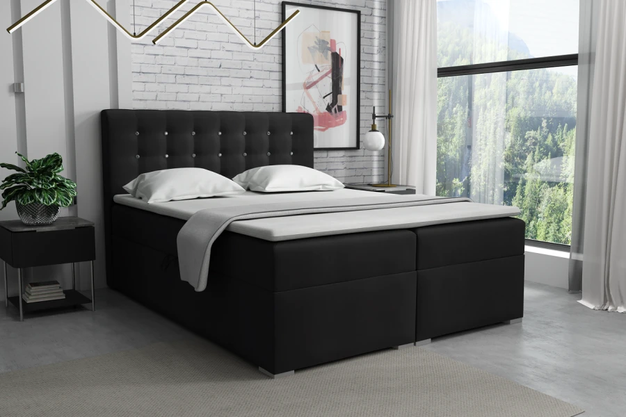 Modernes schwarzes Boxspringbett mit gepolstertem Kopfteil und Glitzersteinen im Schlafzimmer.