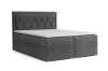 Anthrazitfarbenes Boxspringbett mit Stauraum-Funktion vor weißem Hintergrund.