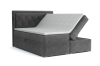 Graues Boxspringbett mit offenem Bettkasten für Stauraum und gepolstertem Kopfteil.