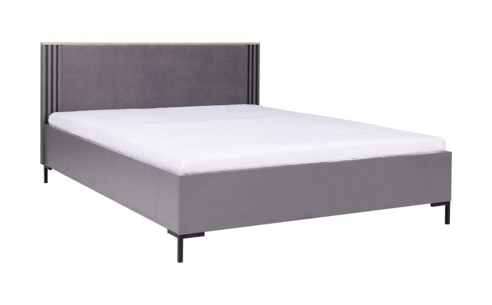 Modernes Polsterbett in Grau mit gepolstertem Kopfteil und minimalistischen Füßen.