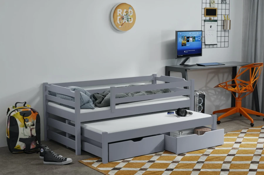 Hellgraues Jugendbett mit Ausziehfunktion und praktischen Bettschubladen.