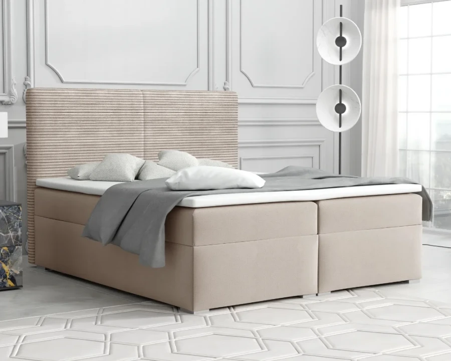 Beiges Boxspringbett mit Kopfteil in Cord-Optik und grauer Bettwäsche