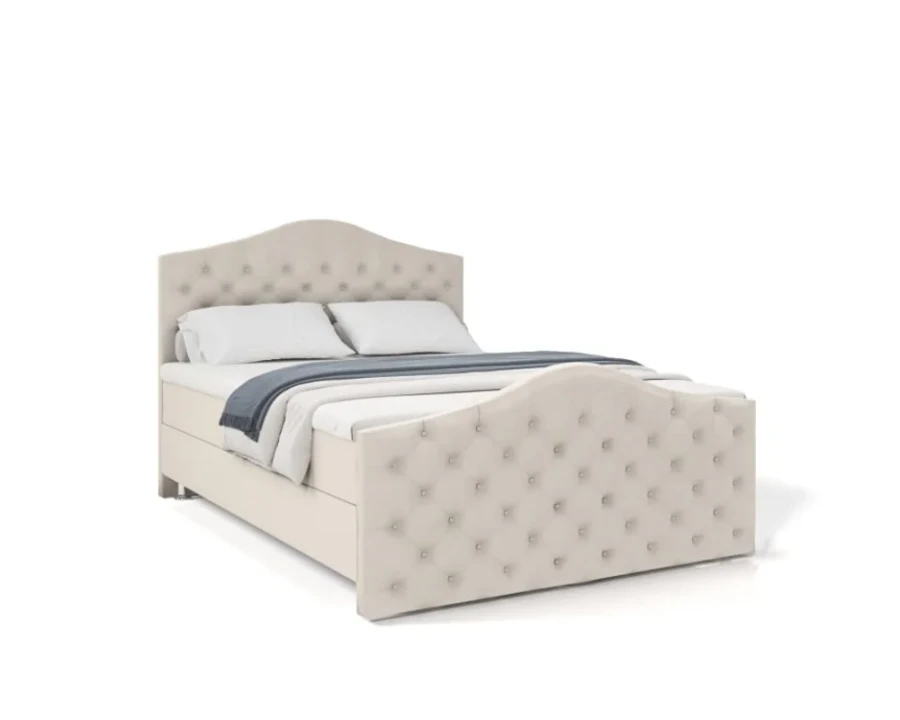 Beiges gepolstertes Bett mit Knopfheftung am Kopf- und Fußteil vor weißem Hintergrund.
