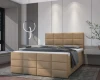 Modernes Polsterbett in Beige mit quadratischer Steppung und hohem Kopfteil im Schlafzimmer.