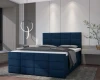 Hochwertiges Polsterbett in Dunkelblau mit moderner Steppung und komfortablem Design.