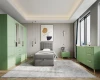 Modernes Schlafzimmer mit salbeigrünem Kleiderschrank, grauem Polsterbett und passender Kommode.