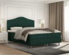 Modernes dunkelgrünes Boxspringbett mit gestepptem Kopfteil im Schlafzimmer.