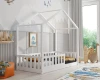 Hausbett für Kinder in weiß in einem liebevoll dekorierten Kinderzimmer