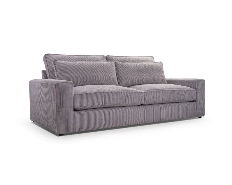 Graues Sofa in Cord-Optik, gemütlicher 3-Sitzer mit Kissen, schräge Ansicht von vorne.