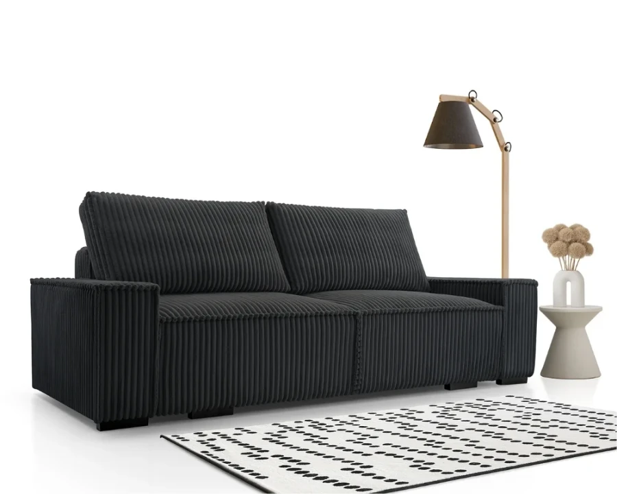 Dunkelgraues Sofa mit Cord-Bezug, gemütliches Cordsofa in Anthrazit mit Stehleuchte.