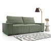 Gemütliches salbeigrünes Cord-Sofa als Blickfang im modernen Wohnzimmer.