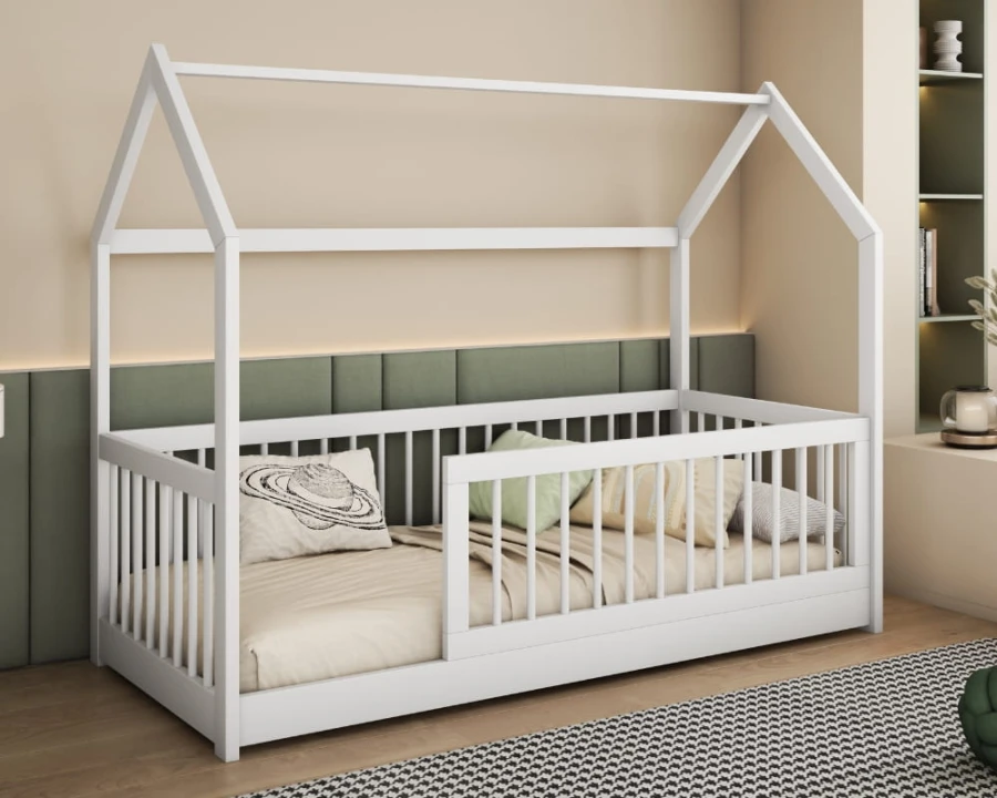 Modernes weißes Hausbett aus Holz für Kinder, inklusive Rausfallschutz und Lattenrost.