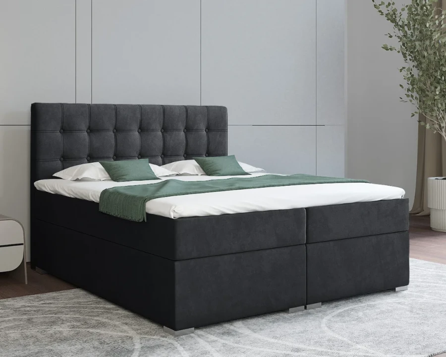 Modernes Boxspringbett in Anthrazit mit gestepptem Kopfteil.
