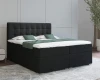 Elegantes schwarzes Boxspringbett mit gepolstertem Rückenteil.