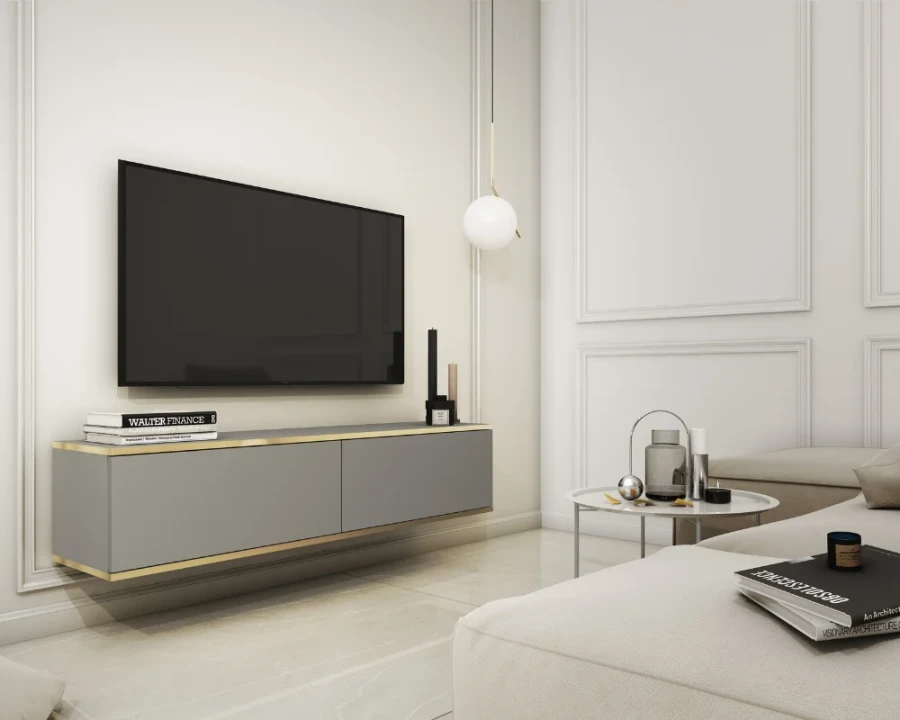 Graues schwebendes TV-Board mit Goldakzenten im modernen Wohnzimmer.
