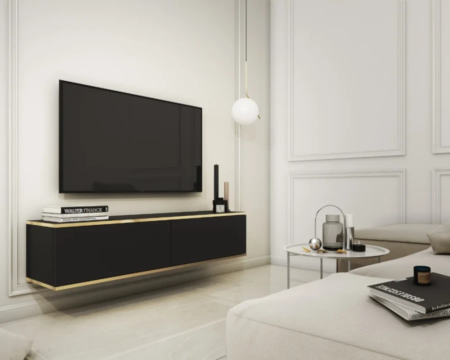 Schwarzes hängendes Lowboard mit Goldkante im eleganten Wohnbereich.