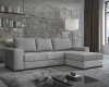 Hellgraues L-Sofa aus Cord im modernen Wohnzimmer-Ambiente.