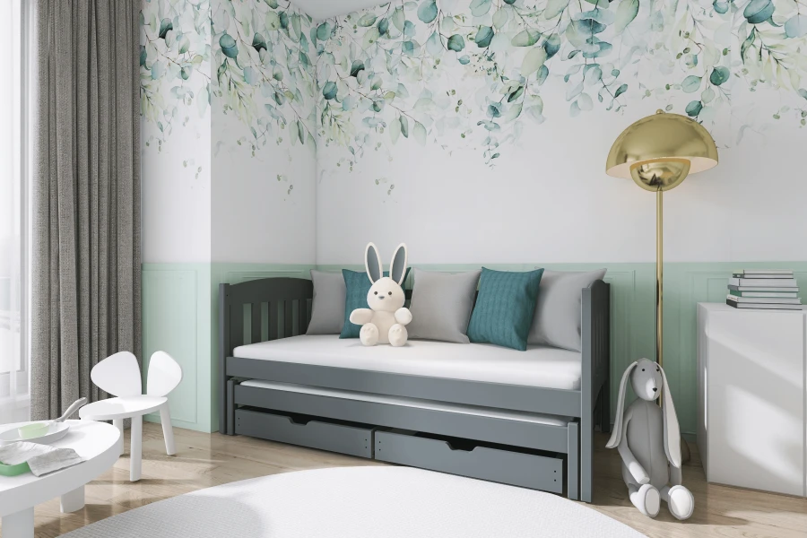 Furnished children's room with a grey pull-out bed, floral wall design and decorative rabbits.