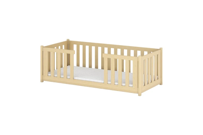 Klassisches Kinderbett aus Kiefernholz mit integriertem Rausfallschutz.