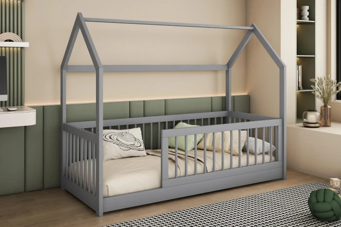 Modernes Hausbett in Grau für das Kinderzimmer, gefertigt aus Holz mit umlaufendem Sicherheitsgitter.