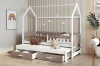 Weißes Hausbett für Kinder mit praktischem Ausziehbett, zwei Schubladen und Rausfallschutz in modernem Beige.